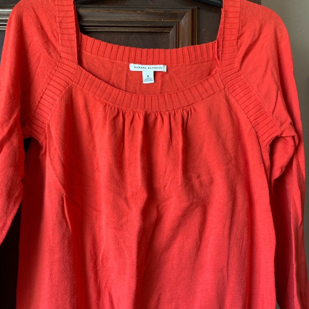 Quarter length sleeve sweater